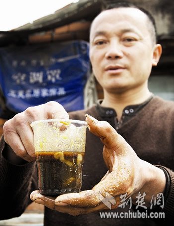 武汉官方否认对教授施压 称地沟油未上餐桌